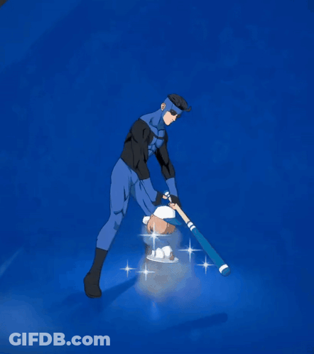 Man In Blue Superhero Costume Swinging A Bat GIF