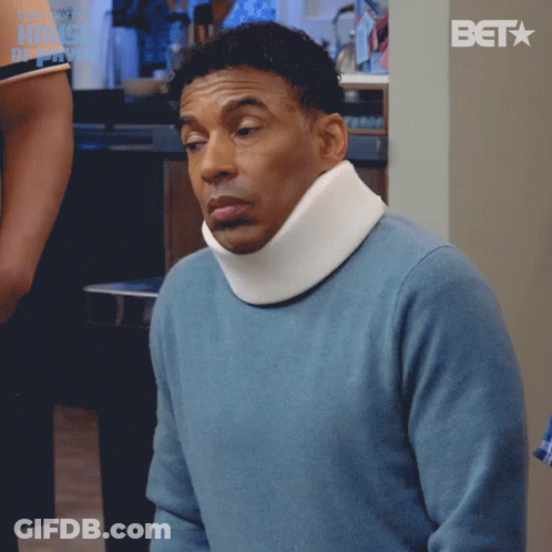 Man In Blue Sweater And White Neck Brace With BET Logo GIF