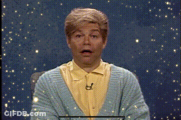 Man In Blue Sweater And Yellow Shirt Making Face GIF