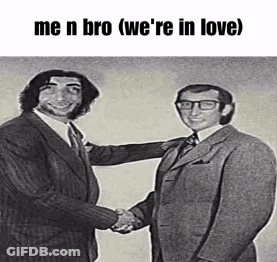 Man In Blue Sweater At Faculty Entrance Sign GIF