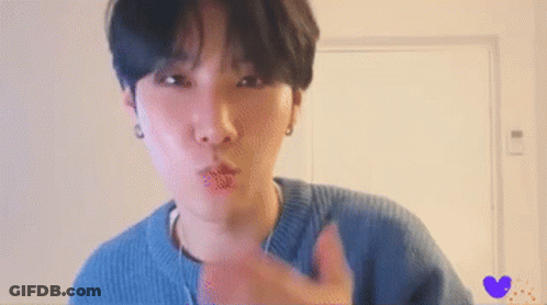 Man In Blue Sweater Blowing Kiss Thumbs Up GIF