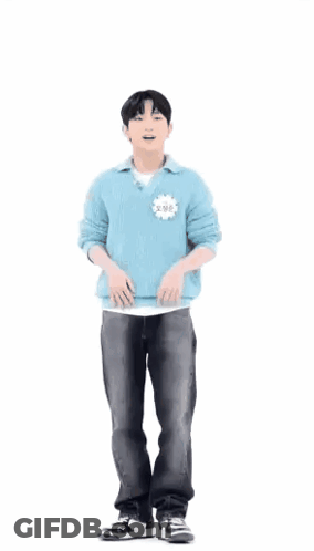 Man In Blue Sweater Dancing With Heart GIF