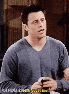 Man In Blue Sweater Saying I Doubt That GIF