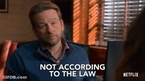 Man In Blue Sweater Saying Not According To Law GIF
