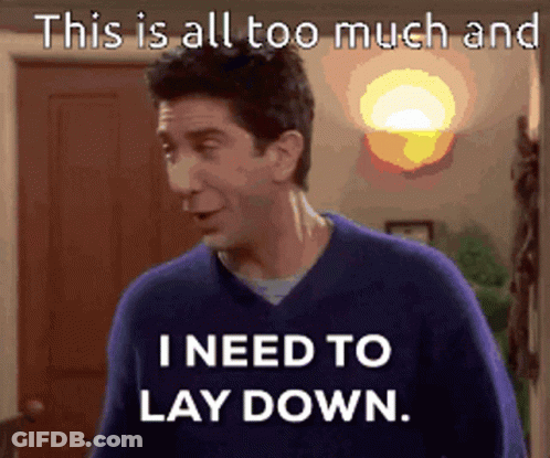 Man In Blue Sweater Says Needs To Lie Down GIF