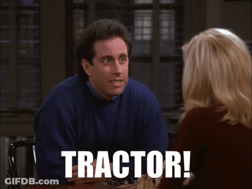 Man In Blue Sweater Sitting With Woman Tractor On Screen GIF