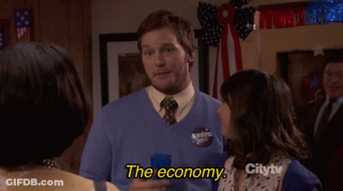Man In Blue Sweater Talking About Economy GIF
