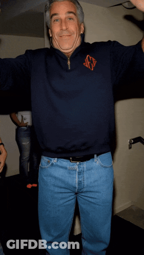 Man In Blue Sweater With Monogram GIF