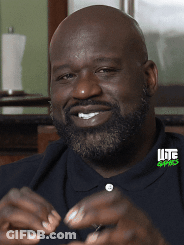 Man In Blue Sweatshirt With Young Boy In Stadium GIF