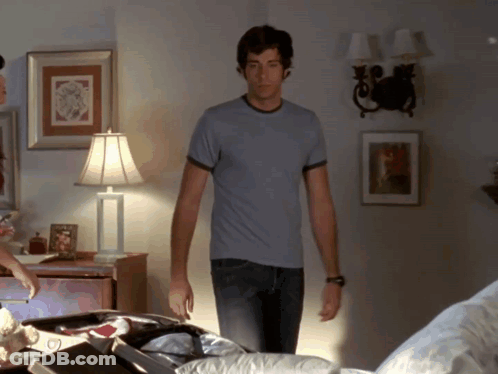 Man In Blue T-Shirt Standing GIF