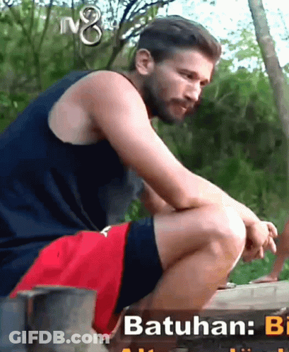 Man In Blue Tank Top And Red Shorts GIF