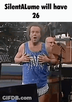 Man In Blue Tank Top At Microphone GIF