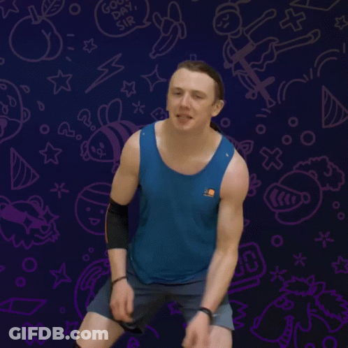 Man In Blue Tank Top Thumbs Up Reminder To Book GIF