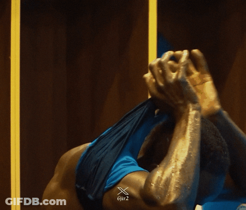 Man In Blue Tank Top With Gif2 Watermark GIF
