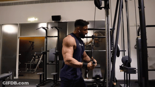 Man In Blue Tank Top Working Out GIF
