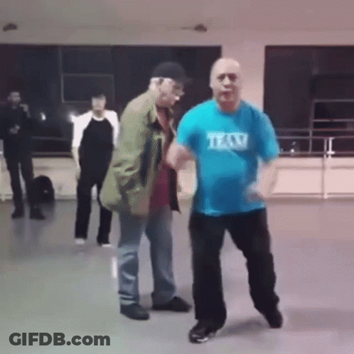 Man In Blue Taxi Shirt Dancing GIF