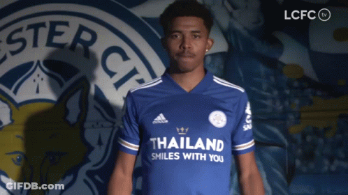 Man In Blue Thailand Shirt Smiling GIF