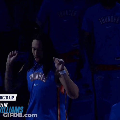 Man In Blue Thunder Jersey In Front Of Williams Sign GIF