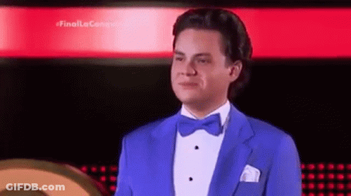 Man In Blue Tuxedo And Bow Tie GIF