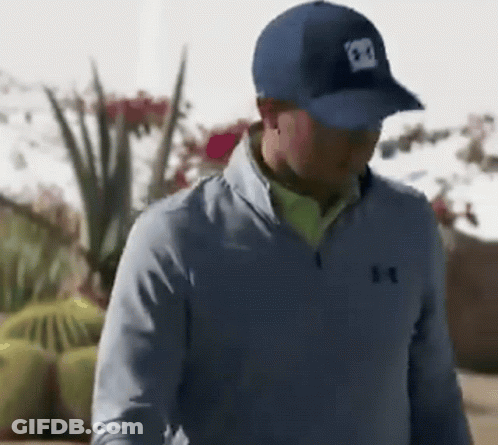 Man In Blue Under Armour Jacket And Hat GIF