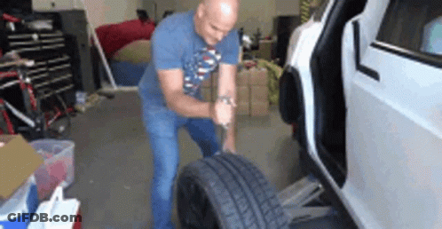 Man In Blue Under Armour Jacket And Hat GIF