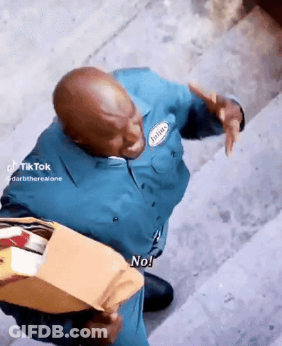 Man In Blue Uniform Holding Envelope Saying No GIF