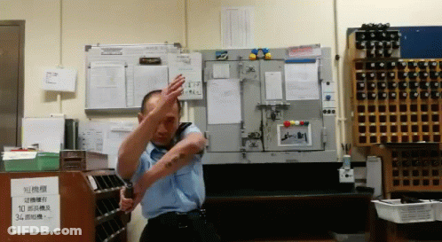 Man In Blue Uniform With Sign Saying 10 GIF