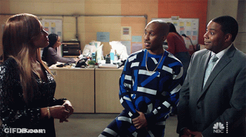 Man In Blue White Sweater Beside Woman And Man In Suit GIF