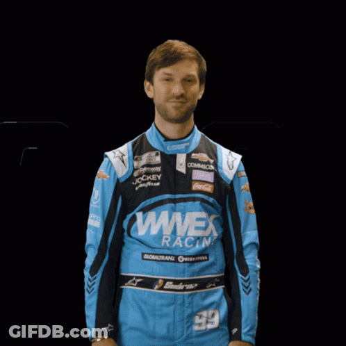 Man In Blue Wwex Racing Jacket Raises Hand GIF