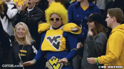 Man In Blue Yellow Costume With W Crowd GIF