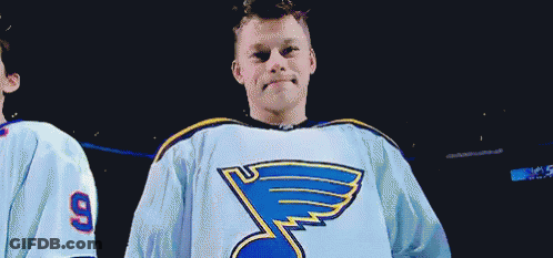 Man In Blues Jersey Next To Man With Number 9 GIF