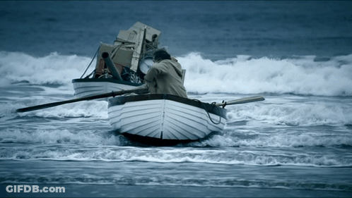 Man In Boat Carrying Boxes GIF