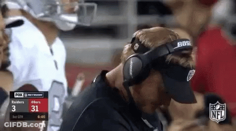 Man In Bose Headphones Watching Football GIF