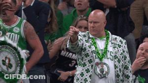 Man In Boston Celtics Jacket Pointing GIF