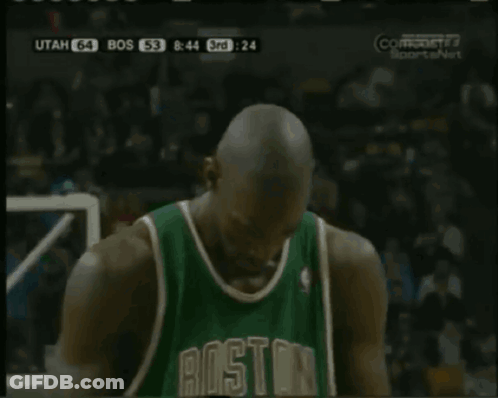 Man In Boston Jersey Holding Basketball GIF