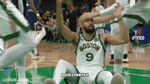 Man In Boston Jersey Sitting On Floor GIF