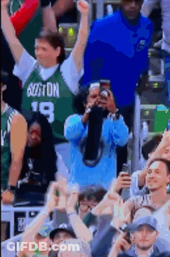 Man In Boston Jersey Taking Picture Of Crowd GIF