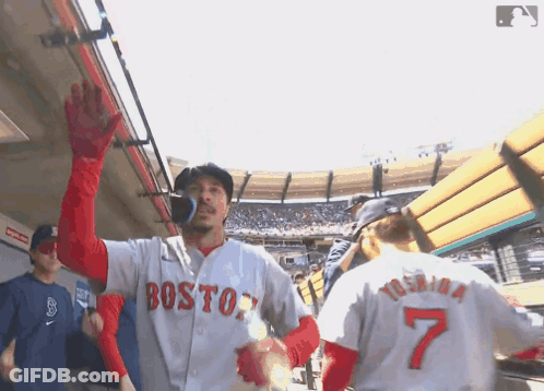 Man In Boston Jersey Waves To Another Man GIF