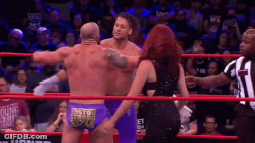 Man In Boston Strong Style Trunks Hugging Woman GIF