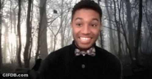 Man In Bow Tie Smiling GIF