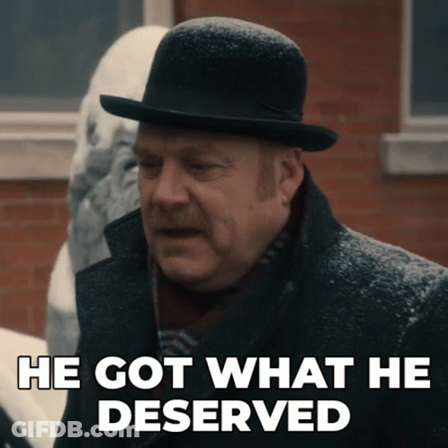 Man In Bowler Hat And Coat Says He Got What He Deserved GIF
