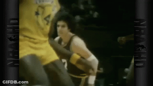 Man In Boxing Glove Next To Man In Yellow Shirt GIF