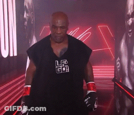 Man In Boxing Gloves And Black Shirt With LR GIF