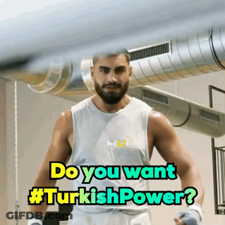 Man In Boxing Gloves In Front Of Do You Want #Turkishpower Sign GIF