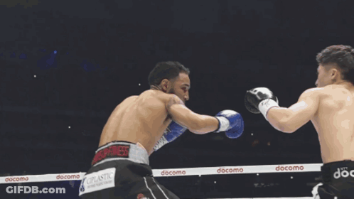 Man In Boxing Gloves Number 11 GIF