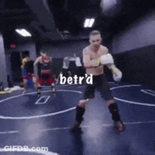 Man In Boxing Gloves Standing In Ring With Betr'd GIF