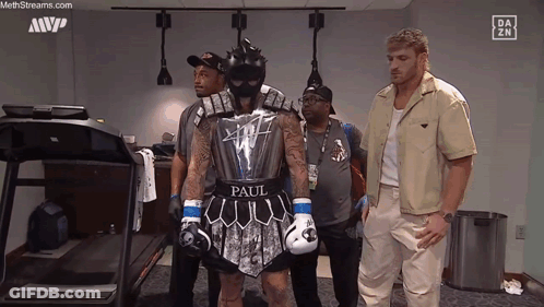 Man In Boxing Outfit With Paul GIF