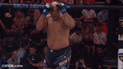 Man In Boxing Ring Before Delta Center Sign GIF
