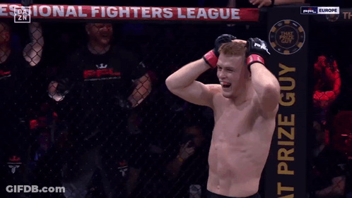 Man In Boxing Ring In Front Of OnlyFans Banner GIF