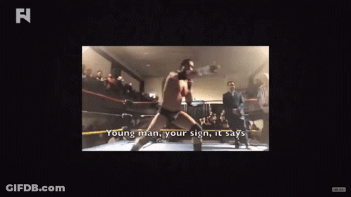 Man In Boxing Ring Saying Young Man Your Sign GIF